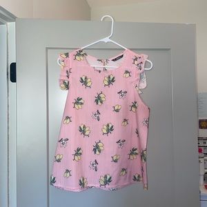 Women’s size medium top with ruffle detail, perfect condition